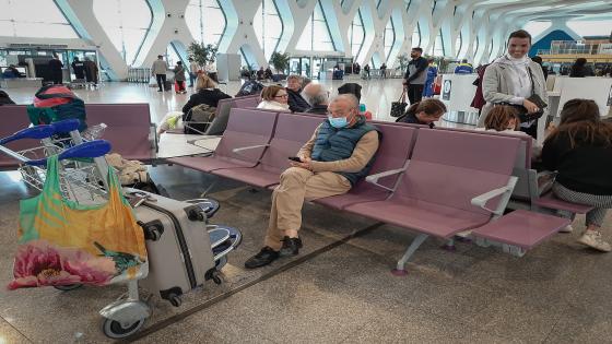 Passengers wait for their flights at the Marrakesh Airport on March 15, 2020. - Several special flights departed Morocco taking thousands of stranded Europeans home as the kingdom announced it was suspending all regular air traffic due to the coronavirus, authorities and airports said. Morocco said it had decided to suspend all international commercial flights "until further notice", extending a ban that had previously been applied to around 30 nations, including Italy, France and Spain. (Photo by - / AFP) (Photo by -/AFP via Getty Images)